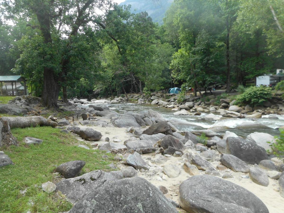 The Evening Shade River And Hotel Chimney Rock