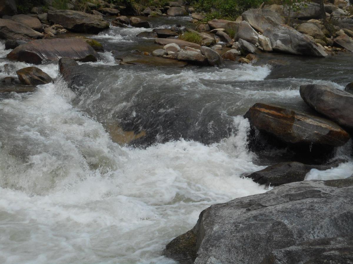 The Evening Shade River And Chimney Rock